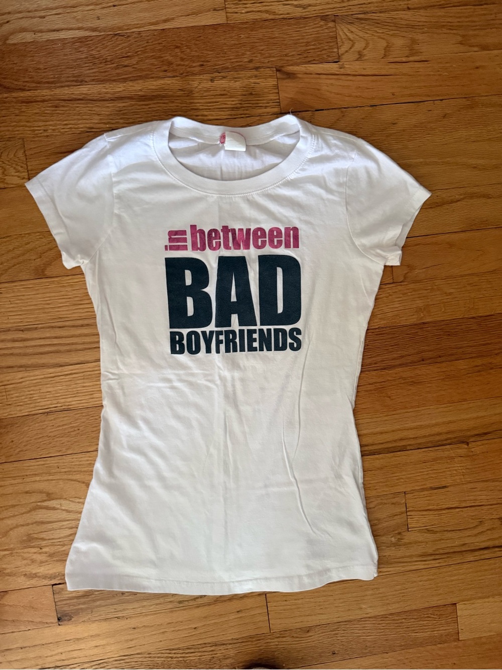 White Graphic Tee "Between Bad Boyfriends"